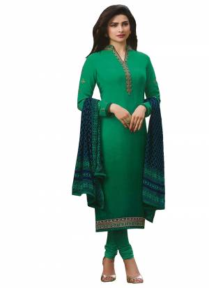 Celebrate This Festive Season Wearing This Designer Straight Suit In Sea Green Color Paired With Contrasting Navy Blue Colored Dupatta. Its Top And Bottom Are Crepe Fabricated Paired With Chiffon Dupatta. Its Fabrics Ensures Superb Comfort All Day Long. 