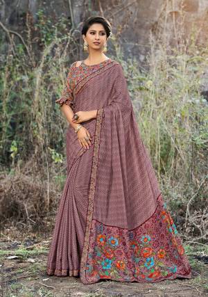 Rich And Elegant Looking Color Pallete Is Here With This Designer Printed Saree In Mauve Color Paired With Multi Colored Blouse. This Saree And Blouse Are Satin Georgette Based Beautified With Floral Prints. 