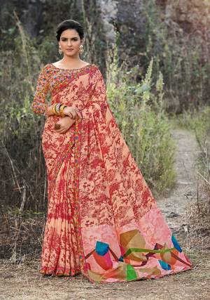 Grab This Very Pretty Saree In Peach Color Paired With Multi Colored Blouse. This Saree And Blouse Are Fabricated On Satin Georgette Beautified With Prints All Over It. 