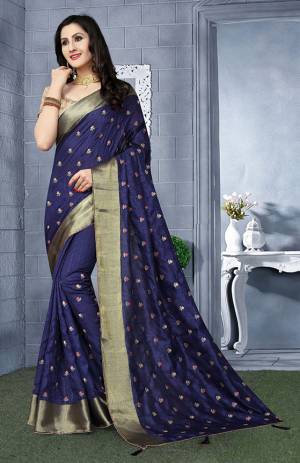 Here Is A Beautiful Designer Silk Based Saree In Navy Blue Color Paired With Beige Colored Blouse. This Saree Is Fabricated On Art Silk Paired With Brocade Fabricated Blouse. It Has Pretty Embroidered Motifs All Over. 