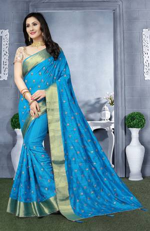 Celebrate This Festive Season wearing This Designer Saree In Blue Color Paired With Beige Colored Blouse. This Saree IS Silk Based With Bricade Fabricated Blouse. It Is Easy To Carry And Durable. 