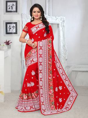Grab This Pretty Georgette Based Saree For The Upcoming Festive And Wedding Season. It Is Beautified With Heavy Thread embroidery All Over. 