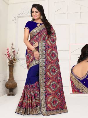 Grab This Pretty Georgette Based Saree For The Upcoming Festive And Wedding Season. It Is Beautified With Heavy Thread embroidery All Over. 