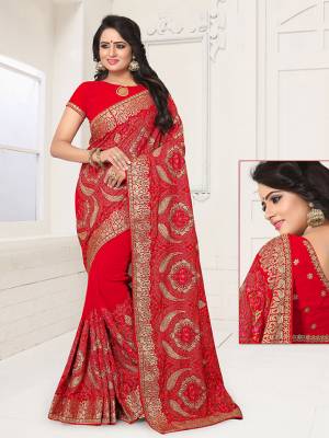 Celebrate This Festive Season With This Heavy Designer Saree Fabricated On Georgette With Georgette Blouse. It Is Beautified With Heavy Thread Embroidery In Multi Color. Grab It Before The Stocks Ends. 