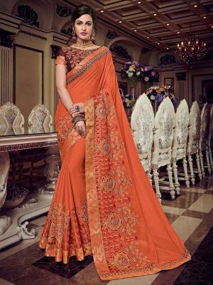 Flaunt a new ethnic look wearing this orange color bright georgette saree. this party wear saree won't fail to impress everyone around you. this gorgeous saree featuring a beautiful mix of designs. Its attractive color and designer heavy embroidered design, Flower patch design, zari resham and sequence work, stone design, beautiful floral design work over the attire & contrast hemline adds to the look. Comes along with a contrast unstitched blouse.