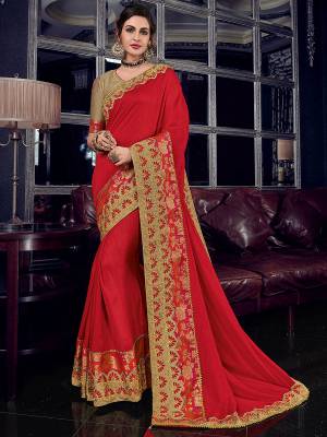 The fabulous pattern makes this red color silk fabrics saree. Ideal for party, festive & social gatherings. this gorgeous saree featuring a beautiful mix of designs. Its attractive color and designer heavy embroidered design, Flower patch design, zari resham work, stone design, beautiful floral design work over the attire & contrast hemline adds to the look. Comes along with a contrast unstitched blouse.