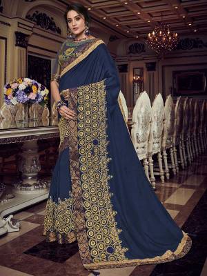 Change your wardrobe and get classier outfits like this gorgeous Blue color silk fabrics saree. Ideal for party, festive & social gatherings. this gorgeous saree featuring a beautiful mix of designs. Its attractive color and designer heavy embroidered design, Flower patch design, zari resham work, stone design, beautiful floral design work over the attire & contrast hemline adds to the look. Comes along with a contrast unstitched blouse.