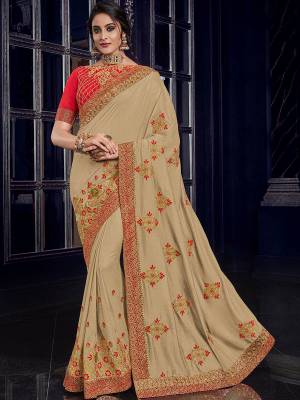 Show your elegance by wearing this gorgeous Cream color silk fabrics saree. Ideal for party, festive & social gatherings. this gorgeous saree featuring a beautiful mix of designs. Its attractive color and designer heavy embroidered design, Flower patch design, zari resham work, stone design, beautiful floral design work over the attire & contrast hemline adds to the look. Comes along with a contrast unstitched blouse.