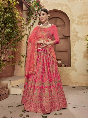 Bright And Visually Appealing Color Is Here With This Designer Lehenga Choli Dark Pink Colored Blouse And Dupatta Paired With Dark Pink Colored Lehenga. It IS Satin Silk Based Paired With Net Fabricated Dupatta. Buy Now.