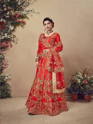 Get Ready For Your Big Day With This Heavy Designer Lehenga Choli In Red Color. This Heavy Embroidered Lehenga Choli Is Fabricated On Velvet Paired With Net Fabricated Dupatta. It Is Beautified With Heavy Jari Embroidery and Stone Work. Buy Now. 