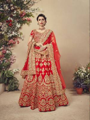 Here Is A Perfect Bridal Look For You With This Heavy designer Lehenga Choli In Red Color. This Lehenga Choli Is Velvet Based Paired With Net Fabricated Dupatta.Its Fabric Also Ensures Superb Comfort Throughout The Gala. 