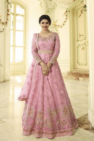 Look Pretty In This Beautiful Designer Floor Length Suit In Pink Color Paired With Pink Colored Bottom And Dupatta. Its Top And Dupatta Are Fabricated On Net Paired With Santoon Bottom. Buy This Now.