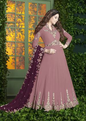 Simple And Elegant Looking, Designer Floor Length Suit Is Here In Pink Color Paired With Pink Colored Bottom And Dark Magenta Pink Colored Dupatta. Its Top And Dupatta Are Fabricated On Georgette Paired With Santoon Bottom. Its Pretty Color And Embroidery Will Earn You Lots Of Compliments From Onlookers. Buy Now.