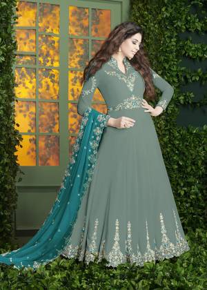 Simple And Elegant Looking, Designer Floor Length Suit Is Here In Steel Blue Color Paired With Steel Blue Colored Bottom And Blue Colored Dupatta. Its Top And Dupatta Are Fabricated On Georgette Paired With Santoon Bottom. Its Pretty Color And Embroidery Will Earn You Lots Of Compliments From Onlookers. Buy Now.
