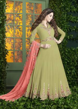 Simple And Elegant Looking, Designer Floor Length Suit Is Here In Light Green Color Paired With Light Green Colored Bottom And Dark Peach Colored Dupatta. Its Top And Dupatta Are Fabricated On Georgette Paired With Santoon Bottom. Its Pretty Color And Embroidery Will Earn You Lots Of Compliments From Onlookers. Buy Now.