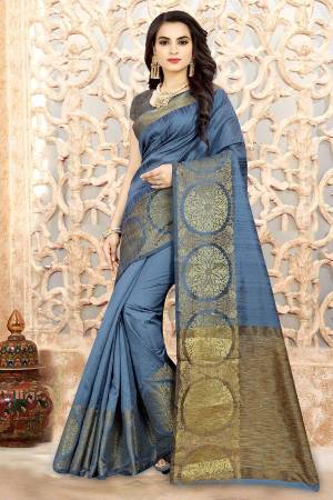 Here Is A New Shade To Add Into Your Wardrobe With This Rich Looking Steel Blue Colored Saree Paired With Steel Blue Colored Bloiuse. This Saree And Blouse Are Fabricated On Linen Silk Beautified With Weave. 