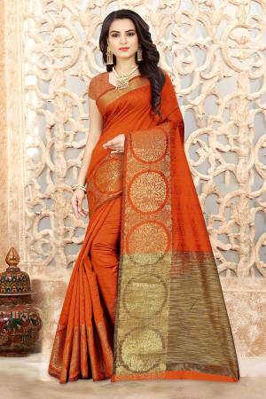 Shine Bright In This Lovely Orange Colored Saree Paired With Orange Colored Blouse. This Lovely Linen Silk Based Saree Gives A Rich Look To Your Personality. Buy Now.