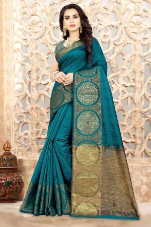 Enhance Your Personality In This Pretty Silk Based Saree In Blue Color Paired With  Blue Colored Blouse. This Saree and Blouse Are Fabricated Linen Silk Which Is Light Weight And Durable. 