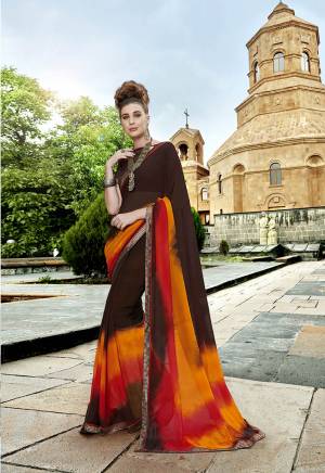 Rich And Elegant Looking Saree Is Here In Brown Color Paired With Brown Colored Blouse. This Saree Is Fabricated On Georgette Paired With Art Silk Fabricated Blouse. It Has Simple Prints And Pretty Lace Border. 