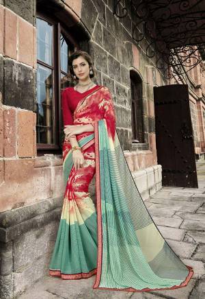 New Combination Is Here With This Saree In Red And Aqua Blue Color Paired With Red Colored Blouse. It Is Georgette Based Which Is Easy To Carry And Ensures Superb Comfort All Day Long. 