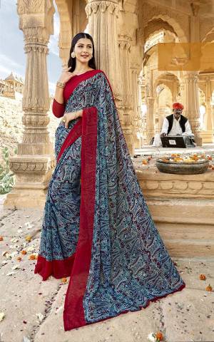 Get This Pretty Georgette Based Saree For Your Casual Wear. This Saree And Blouse Are Fabricated On Georgette Beautified With Prints All Over. Buy Now.