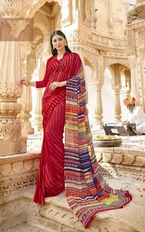 Pretty Amazing Saree Is Here For Your Casual Or Semi Casual Wear. This Saree And Blouse Are Fabricated On Georgette Beautified With Prints All Over. 
