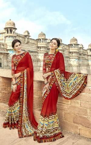 Here Is A Very Pretty And Elegant Looking Saree In Red Color Paired With Multi Colored Blouse. This Saree Is Fabricated On Georgette Paired With Art Silk And Net Fabricated Blouse. It Is Light Weight And Easy To Drape. 