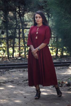Simple And Elegant Looking Readymade Kurti Is Here In Maroon Color For Your Casual Wear. This Pretty Kurti Is Fabricated On Rayon Cotton Which Is Soft Towards Skin And Ensures Superb Comfort All Day Long. 