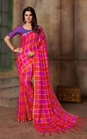 Grab This Attractive Looking Checks Printed Saree In Pink And Purple Color Paired With Purple Colored Blouse. This Saree And Blouse are Fabricated On Art Silk Which Also Gives A Rich Look To Your Personality. 