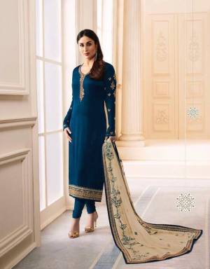 Enhance Your Personality Wearing This Designer Straight Suit In Navy Blue Color Paired With Cream Colored Dupatta. Its top Is Fabricated On Georgette Satin Paired With Santoon Bottom And Heavy Embroidered Chiffon Dupatta. 