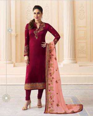 You Will Definitely Earn Lots Of Compliments Wearing This Designer Straight Suit In Maroon Color Paired With Light Pink Colored Dupatta. Its Top Is Fabricated On Georgette Satin Paired With Santoon Bottom And Chiffon Dupatta. It Is Light Weight And Easy To Carry All Day Long. 
