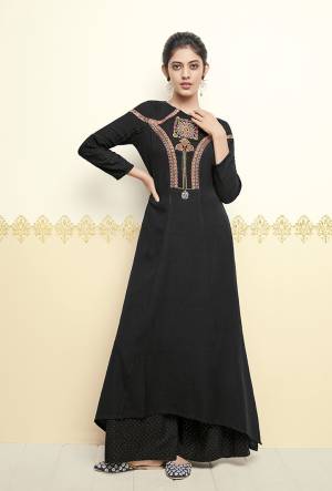 For A Bold and Beautiful Look, Grab This Designer Readymade Kurti In Black Color Fabricated On Cotton. It Has Pretty Embroidered Yoke Making It More Attractive. 