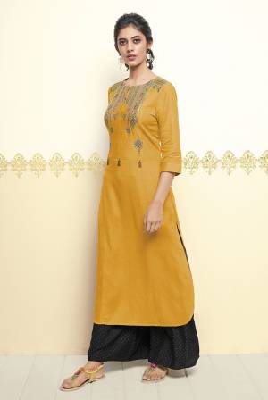 Celebrate This Festive Season Wearing This Readymade Kurti In Yellow Color Fabricated On Cotton. It Has Attractive Multi Colored Thread Embroidery. Buy Now.