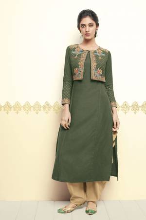 You Will Definitely Earn Lots Of Compliments In This Designer Readymade Kurti In Olive Green color Fabricated On Cotton. It Has Embroidered Koti Pattern With Embroidered Sleeve. Grab It Before The Stock Ends.