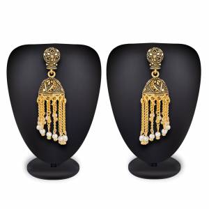 Here Is A Very Pretty Set Of Earrings Set In Golden Color Which Can Be Paired With Any Colored Traditional Attire. Also It Is Light In Weight And Easy To Carry All Day Long. 