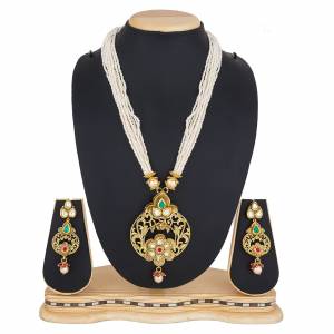 For A Queen Look, Here Is A Designer Royal Looking Necklace Set In Golden Color. This Necklace Set Can Be Paired With Heavy Ethnic Attire For More Enhanced Look. Buy Now.