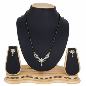 Give An Elegant Look To Your Neckline With This Pretty Set Of Mangalsutra Which Comes With A Pair Of Earrings. Pair This Up With Color And Any Type Of Attire. 