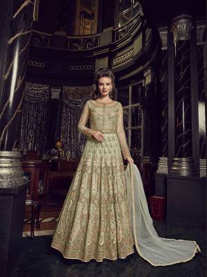 Get Ready For The Upcoming Wedding Season Wearing This Heavy Designer Indo-Western Suit In Pastel Green Color. Its Top And Dupatta Are Net Based Paired With Silk Based Lehenga And Embroidered Pants. You Can Pair With Any Of Bottom As Per The Occasion. 