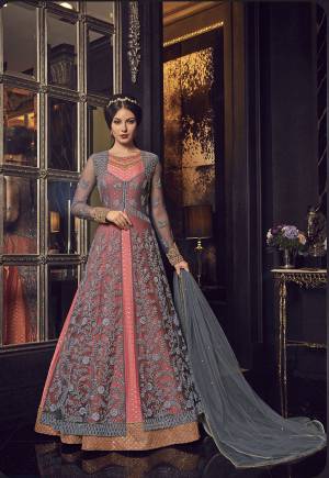 Get Two In Price Of One With This Designer Indo Western Suit In Pink Colored Gown Paired With Grey Colored Jacket And Dupatta. Its Pretty Gown Is Chanderi Fabricated Paired With Heavy Embroidered Net Jacket And Net Fabricated Dupatta. You Can Wear In Two Ways, Either Only Gown And Dupatta Or Gown With Jacket, Style It As Per Comfort And Occasion. 