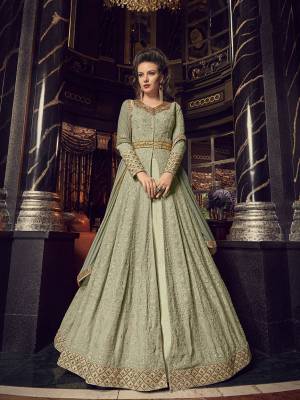 Get Ready For The Upcoming Wedding Season Wearing This Heavy Designer Indo-Western Suit In Mint Green Color. Its Heavy Embroidery Top Is Fabricated On Georgette, Paired With Silk Based Lehenga And Embroidered Pants, with A Very Pretty Chiffon Dupatta. You Can Pair With Any Of Bottom As Per The Occasion. 