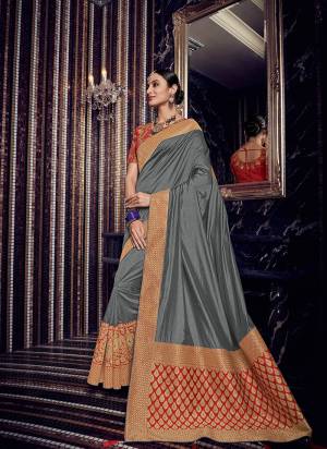 The fabulous pattern makes this saree a classy number to be included in your wardrobe. grey color silk fabric with rich jacquard pallu saree. Ideal for party, festive & social gatherings. this gorgeous saree featuring a beautiful mix of designs. Its attractive color and designer heavy design, stone design, silk fabric with rich jacquard pallu and beautiful design all over work over the attire & contrast hemline adds to the look. Comes along with a contrast unstitched blouse.