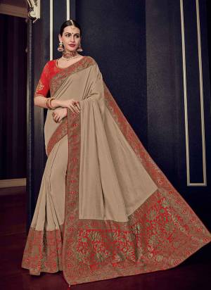 You Look elegant and stylish this festive season by draping this beige color silk fabric with rich jacquard pallu saree. Ideal for party, festive & social gatherings. this gorgeous saree featuring a beautiful mix of designs. Its attractive color and designer heavy design, stone design, silk fabric with rich jacquard pallu and beautiful design all over work over the attire & contrast hemline adds to the look. Comes along with a contrast unstitched blouse.