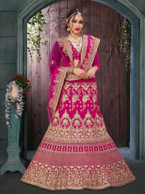 Get Ready For Your Big Day With This Heavy Designer Lehenga Choli?In Pink Color. This Heavy Embroidered Lehenga Choli Is Fabricated On Velvet Paired With Net Fabricated Dupatta. It Is Beautified With Heavy Jari Embroidery and Stone Work. Buy Now