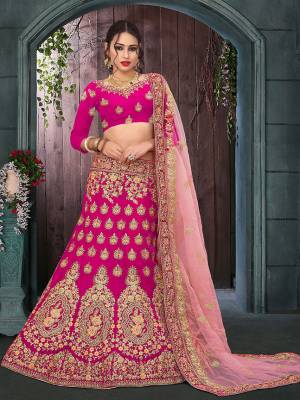 Get Ready For Your Big Day With This Heavy Designer Lehenga Choli?In Pink Paired With Baby Pink Colored Dupatta. This Heavy Embroidered Lehenga Choli Is Fabricated On Velvet Paired With Net Fabricated Dupatta. It Is Beautified With Heavy Jari Embroidery and Stone Work. Buy Now