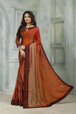 Here Is A Saree For Your Semi-Casual Or Festive Wear. This Lovely Saree And Blouse Are Fabricated On Satin Chiffon Beautified With Prints And Stone Work. Also It Is Light Weight And Soft Towards Skin Which Ensures Superb Comfort all Day Long. 