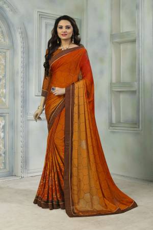 Add This Very Pretty Saree To Your Wardrobe For The Upcoming Festive Season. This Saree And Blouse Are Fabricated On Satin Chiffon Beautified With Prints And Stone Work. Buy Now.