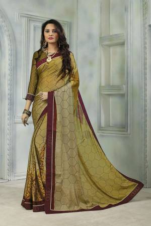 Here Is A Saree For Your Semi-Casual Or Festive Wear. This Lovely Saree And Blouse Are Fabricated On Satin Chiffon Beautified With Prints And Stone Work. Also It Is Light Weight And Soft Towards Skin Which Ensures Superb Comfort all Day Long. 