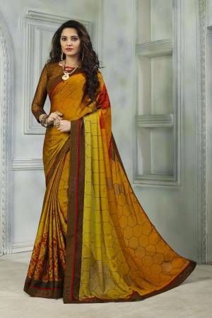 Add This Very Pretty Saree To Your Wardrobe For The Upcoming Festive Season. This Saree And Blouse Are Fabricated On Satin Chiffon Beautified With Prints And Stone Work. Buy Now.