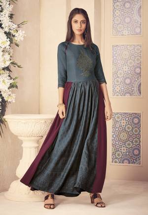 Grab This Designer Readymade Rich Looking Kurti In Dark Grey And Magenta Pink Color. This Kurti Is Fabricated On Rayon Beautified With Printed And Stone Work. It Is Available In All Regular Sizes. Buy Now.