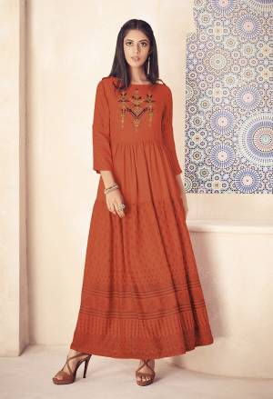 For The Utmost Comfort, Here Is A Designer Readymade Kurti In Rust Orange Color Fabricated On Rayon. It Is Light Weight And Its Fabric Is Soft Towards Skin Which Ensures Superb Comfort All Day Long. 